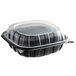 A black plastic container with a clear lid.