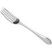 A Libbey stainless steel dinner fork with a design on the handle.