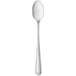 A silver spoon with a long handle.