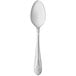 A Libbey stainless steel dessert spoon with a design on the handle.