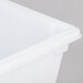 A Rubbermaid white polyethylene food storage box with a lid.