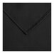 A black fabric table cover with a square edge.
