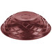 A red plastic lid with a round top on a disc.