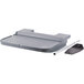 A grey plastic tray with a curved edge and a metal rod on a Cambro end table.