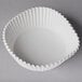 A white paper cupcake liner.