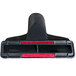 A black and red upholstery nozzle with a red belt.