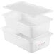 A stack of white Araven plastic food storage containers with lids.