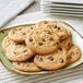 A plate of David's Cookies vegan chocolate chip cookies.