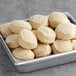 Preformed David's Cookies sugar cookies on a metal pan.