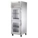 A stainless steel True holding cabinet with glass half doors.