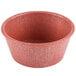 A red polyethylene ramekin with paprika in it.