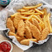 A bowl of Rebellyous Kickin' Chicken Tenders with a bowl of ketchup.