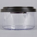 A clear plastic ARY VacMaster vacuum canister with a black lid.