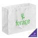 A white customizable paper bag with green text on the front.