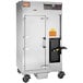 A large stainless steel metal box with a black door and wheels.
