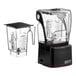 A Blendtec Stealth blender with a WildSide+ container next to it.