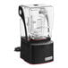 A black and clear Blendtec Stealth 885 blender with a white lid.