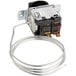 A Robertshaw cooler temperature controller with wires.