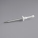 A metal rod with a white tip.