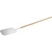A white rectangular aluminum pizza peel with a wooden handle.