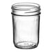 A case of 12 round clear glass mason jelly jars with lids.