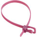 A pink plastic cable tie with metal clip.