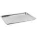 A Carlisle aluminum bun/sheet pan with a wire rim on a counter.