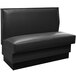 An American Tables & Seating black leather booth seat.
