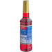 A Torani Cranberry Flavoring Syrup plastic bottle filled with red liquid.