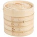 A stack of Town bamboo steamer baskets with a round wooden lid and handle.