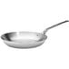 A close-up of a de Buyer stainless steel fry pan with a handle.