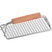 A metal grid with a wood handle.