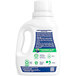 An Arm & Hammer white bottle of laundry detergent with blue and white labels.