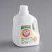 A white bottle of Arm & Hammer laundry detergent with a label.