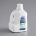 An Arm & Hammer white plastic bottle of liquid laundry detergent with a handle and a cap.