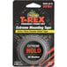 A package of T-Rex Extreme Mounting Tape with a roll of tape inside.