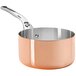 A de Buyer copper saucepan with a handle and lid.