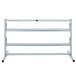 A white metal rack with silver metal bars and three shelves.