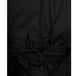 A close up of Chef Revival black baggy chef pants with drawstrings.