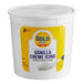 A large white plastic tub of Gold Medal ready-to-spread vanilla creme icing.