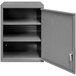 A grey metal Durham 2-shelf wall mounted storage cabinet with a door open.