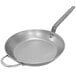 A de Buyer carbon steel frying pan with helper handle.