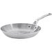 A de Buyer Mineral B Pro carbon steel frying pan with a handle.