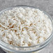 A bowl of white snowflake sprinkles.