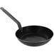 A black frying pan with a handle.