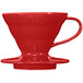 A red Hario V60 ceramic coffee dripper with a handle.