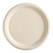 A close-up of an EcoChoice natural bagasse blend plate with a round edge.