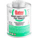 A white can of Oatey heavy duty clear PVC cement with a green label.