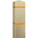 A tan square Innoplast BollardGard with yellow reflective stripes on a post.