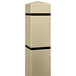 A tan Innoplast square bollard cover with black reflective stripes.